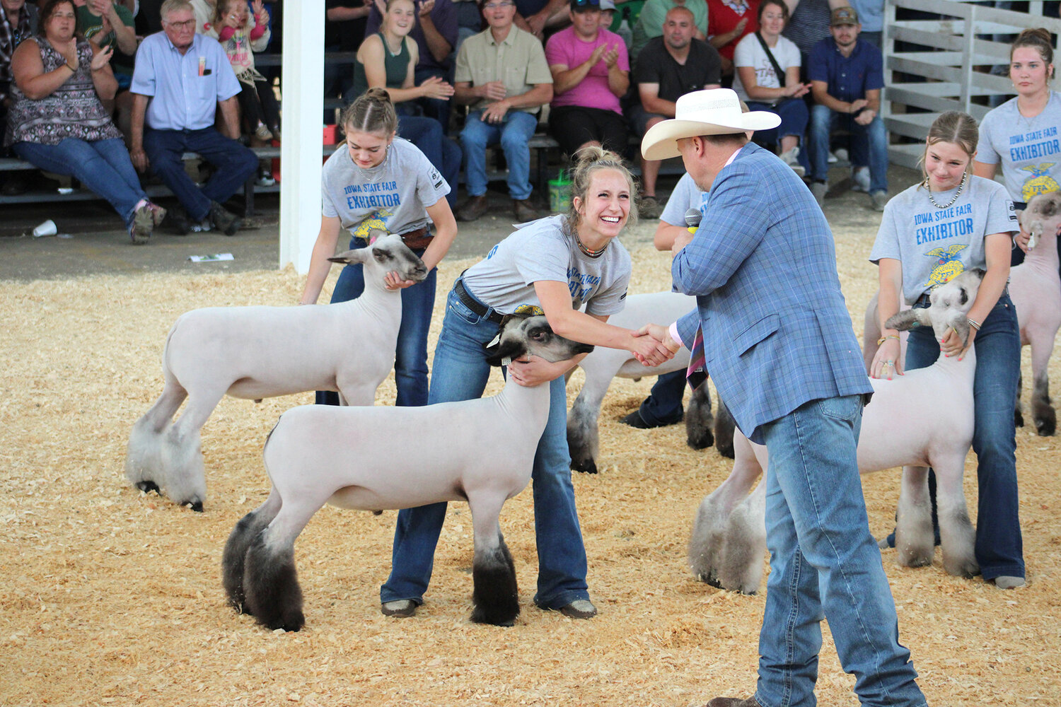 Wilton's Kiley Langley shows State Fair grand champion lamb Wilton